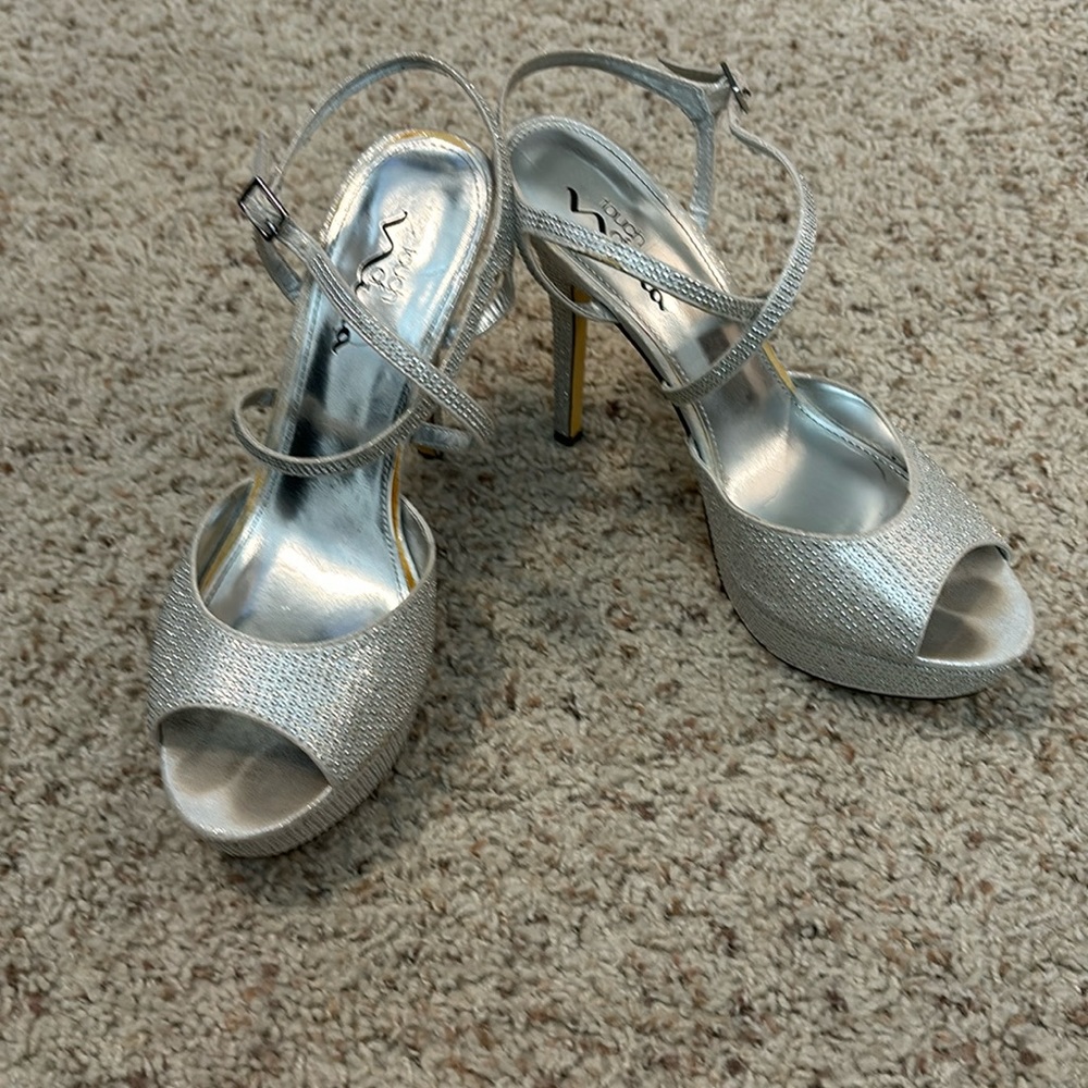 Silver prom shoes.